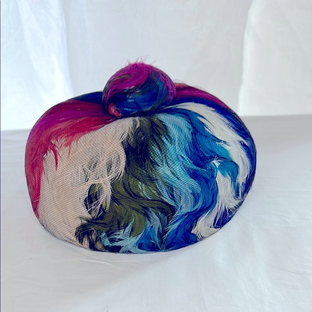 MISTER T Vintage pill box style colorful feather hot with knob on top.